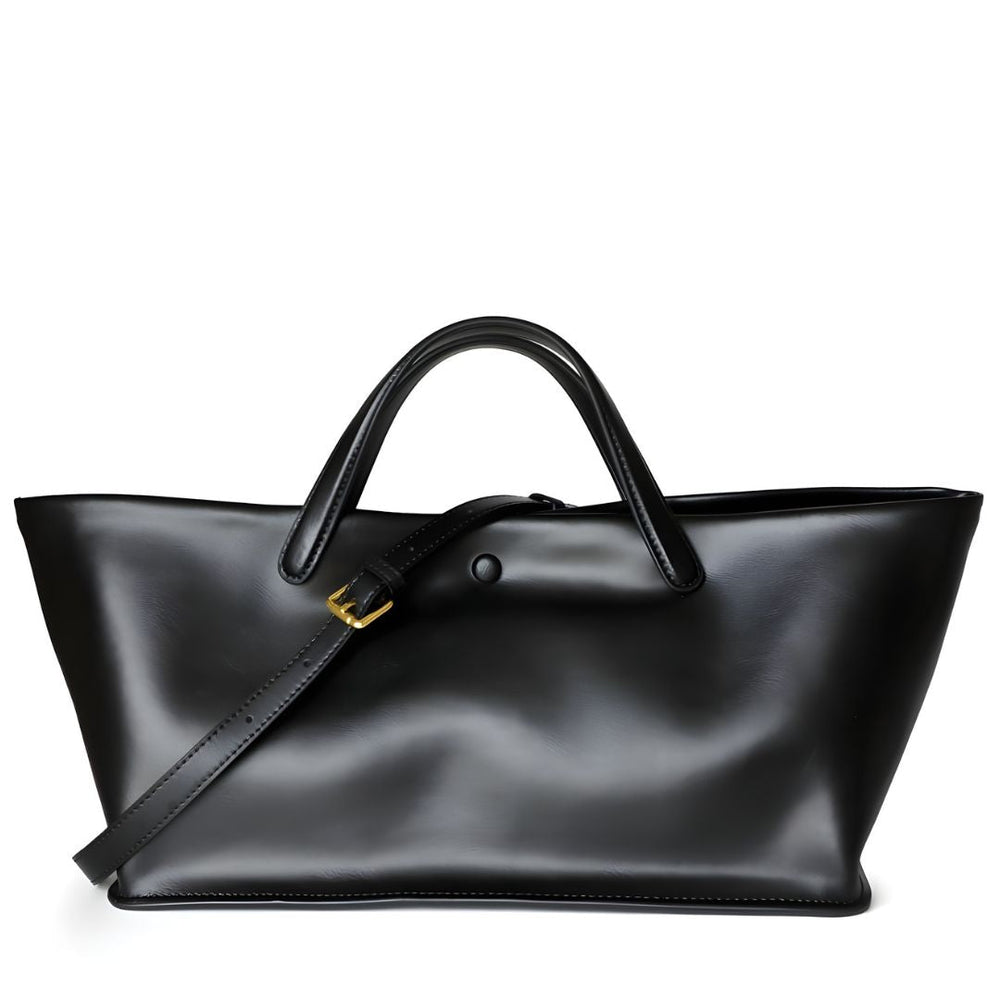 Black handbag with a strap on a white background